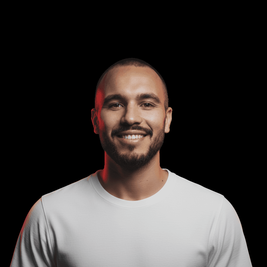 Keep the same person exactly as in the original image, same face, skin tone, beard, hairstyle and lighting.
Keep the same pose, same expression and camera angle.
Replace the current shirt with a plain white t-shirt with realistic fabric texture.
No logos, no text on the shirt.
High realism portrait photography, high resolution, clean background, natural shadows.
Ultra realistic skin details, 8K, HD, photorealistic style.